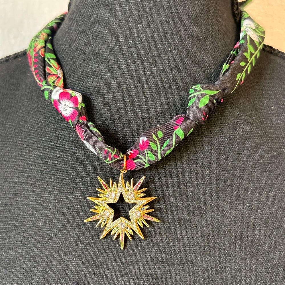 Golden Lily.  Scarf Charm Necklace with Starburst pendant. NWT